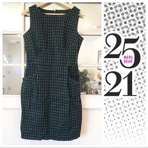 Green and blue houndstooth patterned dress